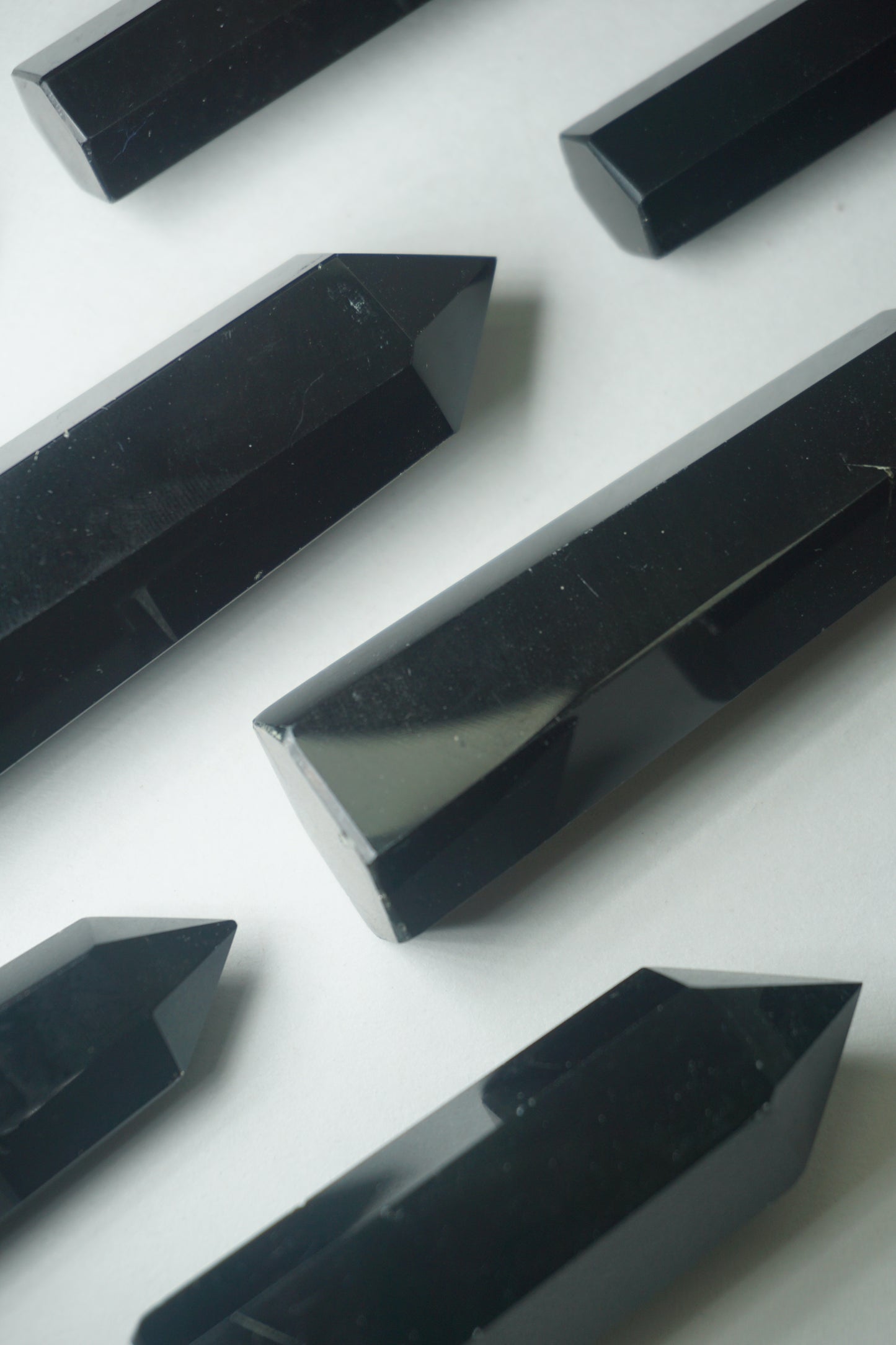 Black Obsidian: A potent and grounding crystal, is revered for its intense protective properties and transformative energy.