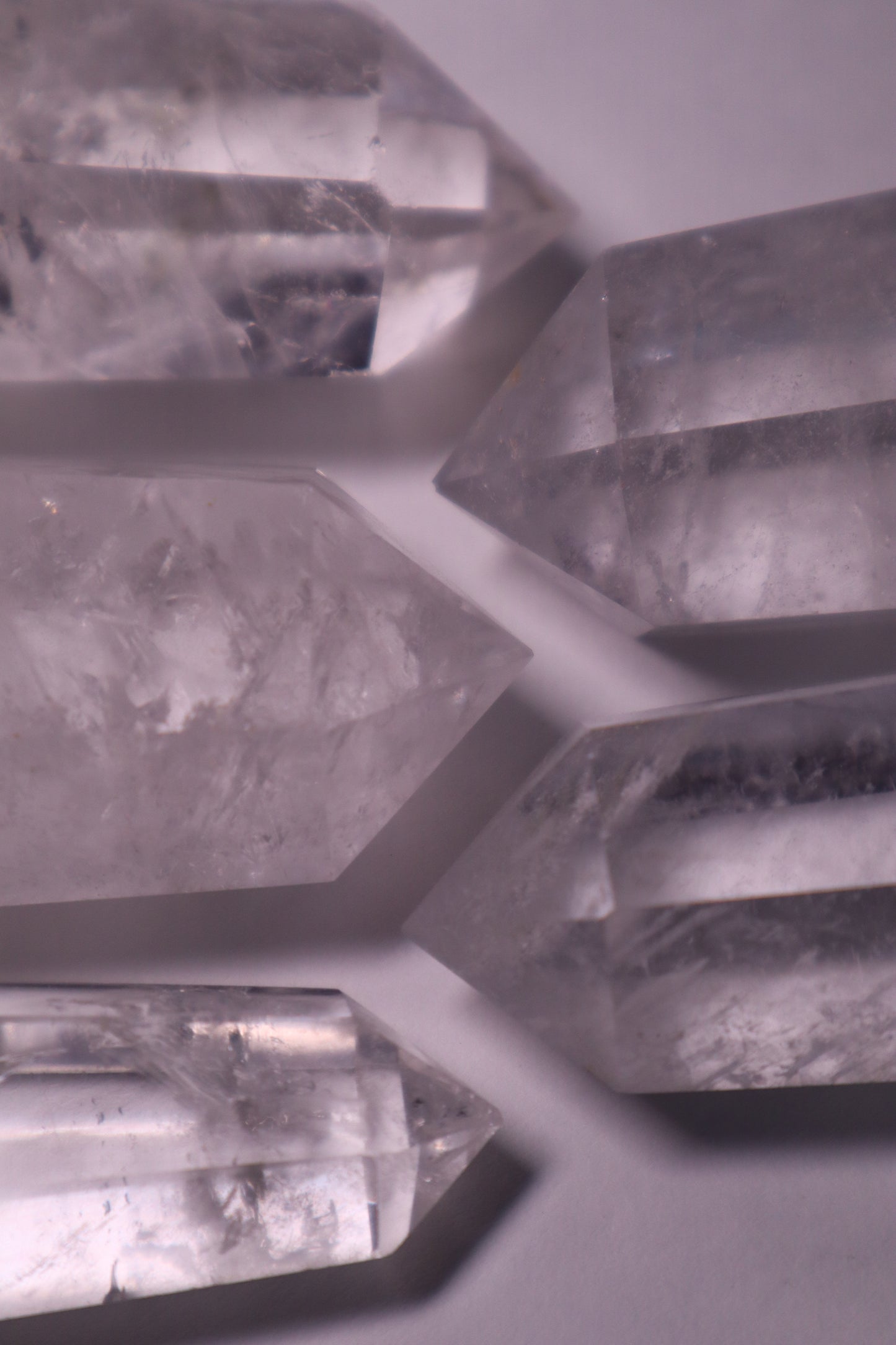 Clear Quartz: A universally revered and versatile crystal, is celebrated for its pure and transparent appearance. As a powerful amplifier of energy, Clear Quartz is believed to enhance intention-setting, manifestation, and the properties of other crystals.