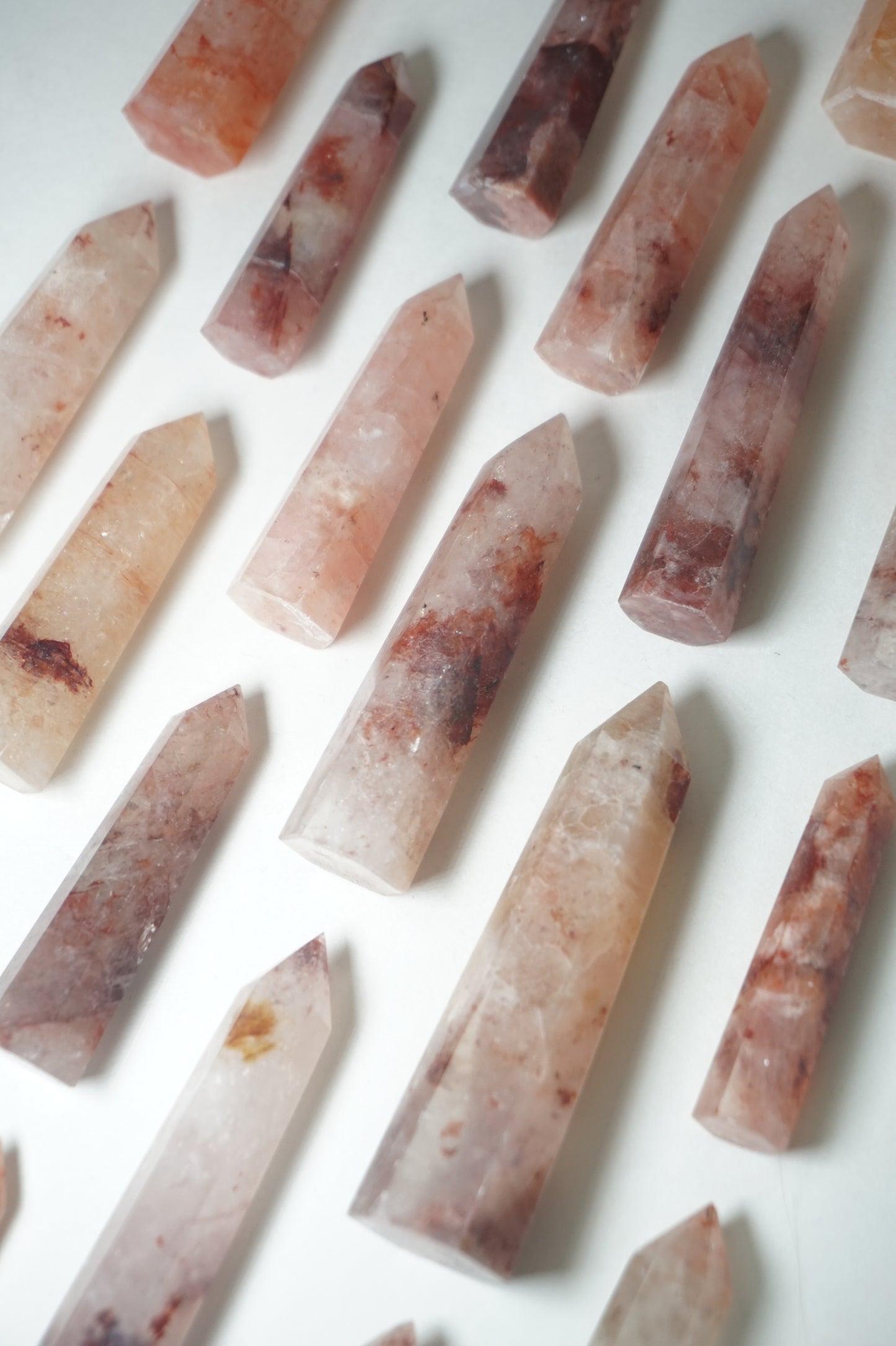 Fire Quartz: A captivating and energizing crystal, is revered for its vibrant orange and red hues that resemble flickering flames.