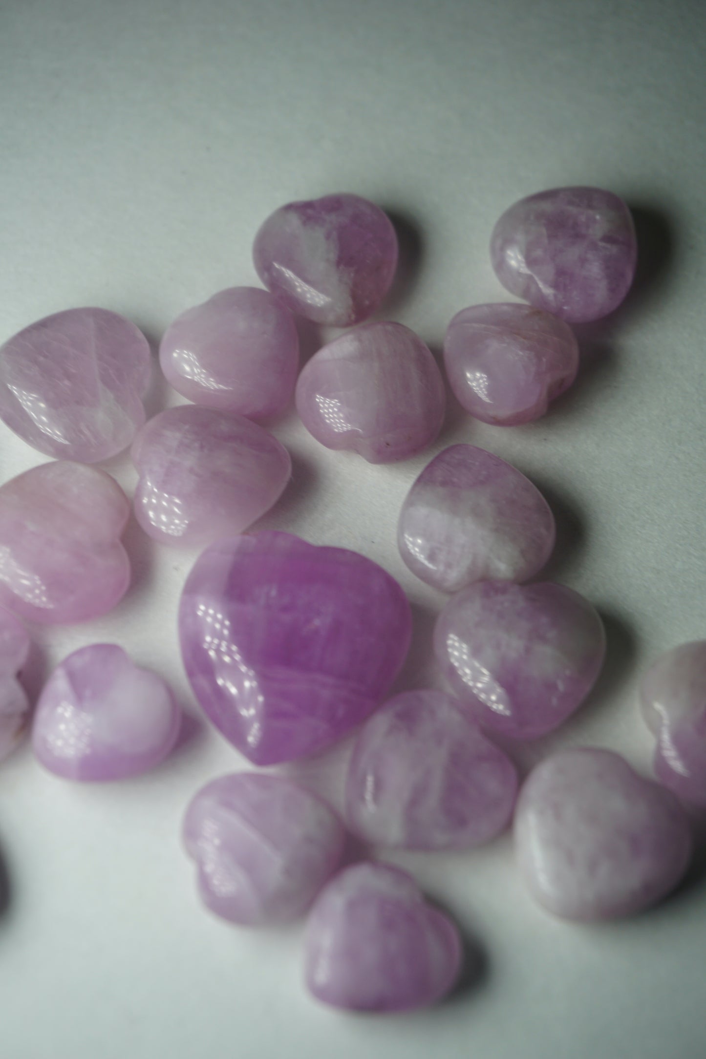 Kunzite: An exquisite and delicate crystal, is renowned for its soft pink to lilac hues that radiate a gentle and loving energy. With its connection to the Heart chakra, Kunzite is believed to open the heart to unconditional love, self-acceptance, and emotional healing.