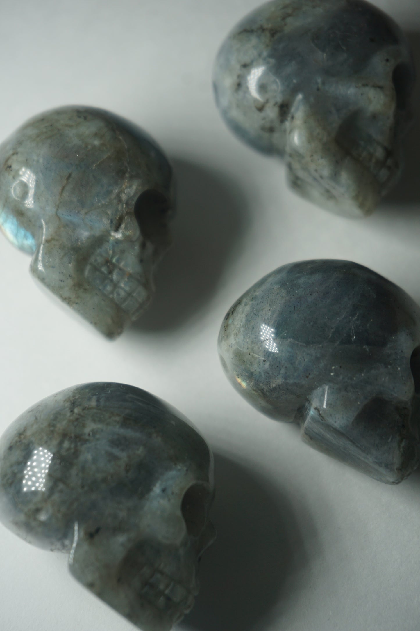 Labradorite: A mesmerizing and iridescent crystal known as the "Stone of Magic," captivates with its play of colors that shift and shimmer when viewed from different angles.