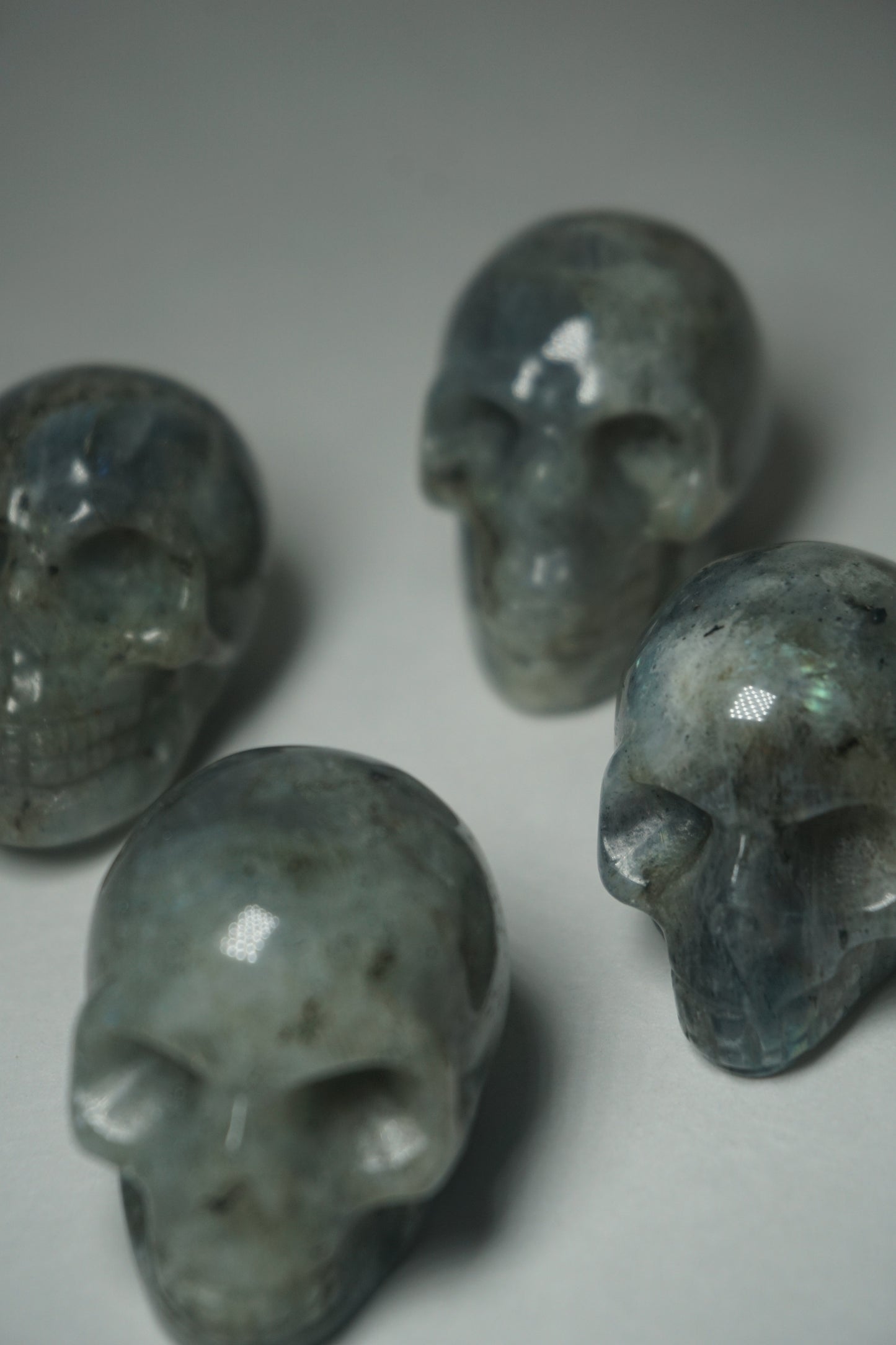 Labradorite: A mesmerizing and iridescent crystal known as the "Stone of Magic," captivates with its play of colors that shift and shimmer when viewed from different angles.