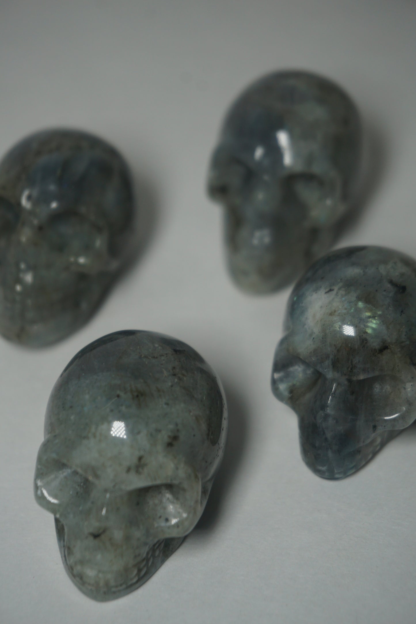 Labradorite: A mesmerizing and iridescent crystal known as the "Stone of Magic," captivates with its play of colors that shift and shimmer when viewed from different angles.