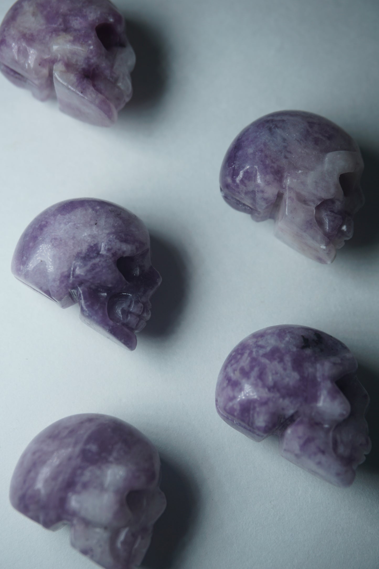 Lepidolite: A serene and calming crystal, is prized for its soft shades of purple and its potent connection to emotional healing and balance. With its association to the Heart, Third Eye, and Crown chakras, Lepidolite promotes inner peace, emotional release, and spiritual insight.