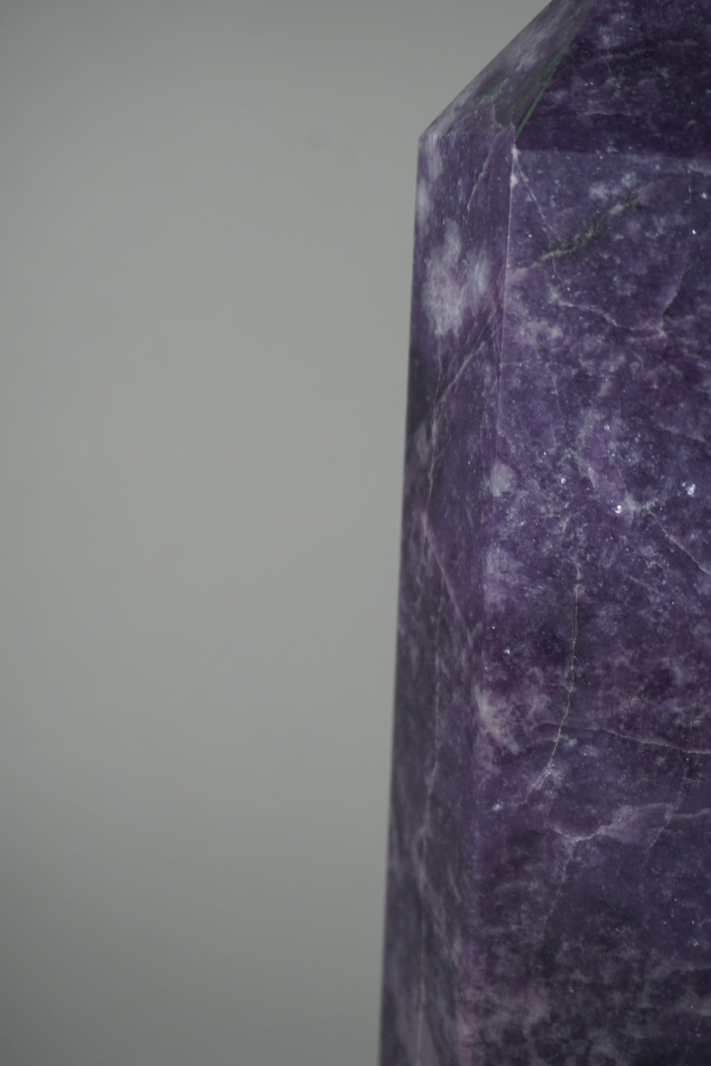 Lepidolite: A serene and calming crystal, is prized for its soft shades of purple and its potent connection to emotional healing and balance. With its association to the Heart, Third Eye, and Crown chakras, Lepidolite promotes inner peace, emotional release, and spiritual insight.