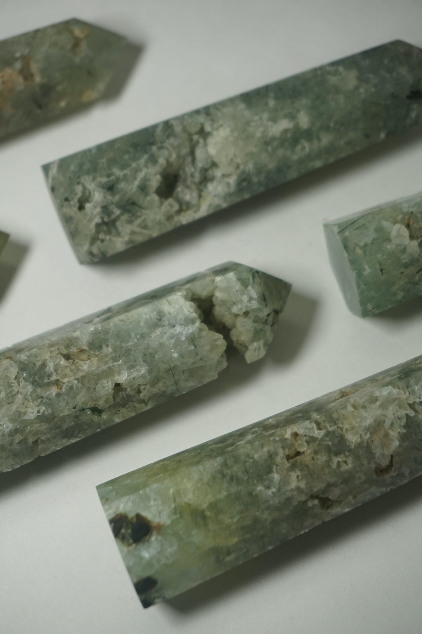 Prehnite: A serene and soothing crystal, is celebrated for its gentle green color and its ability to enhance spiritual growth and connection. With its connection to the Heart chakra, Prehnite promotes emotional healing, inner peace, and a deeper sense of compassion.
