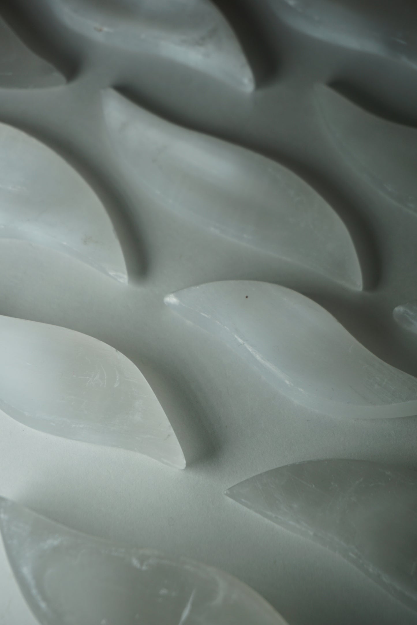 Selenite: A luminous and ethereal crystal, is revered for its radiant white appearance and its potent connection to higher realms. With its association to the Crown chakra, Selenite is believed to enhance spiritual awareness, communication with angels, and deep meditation.