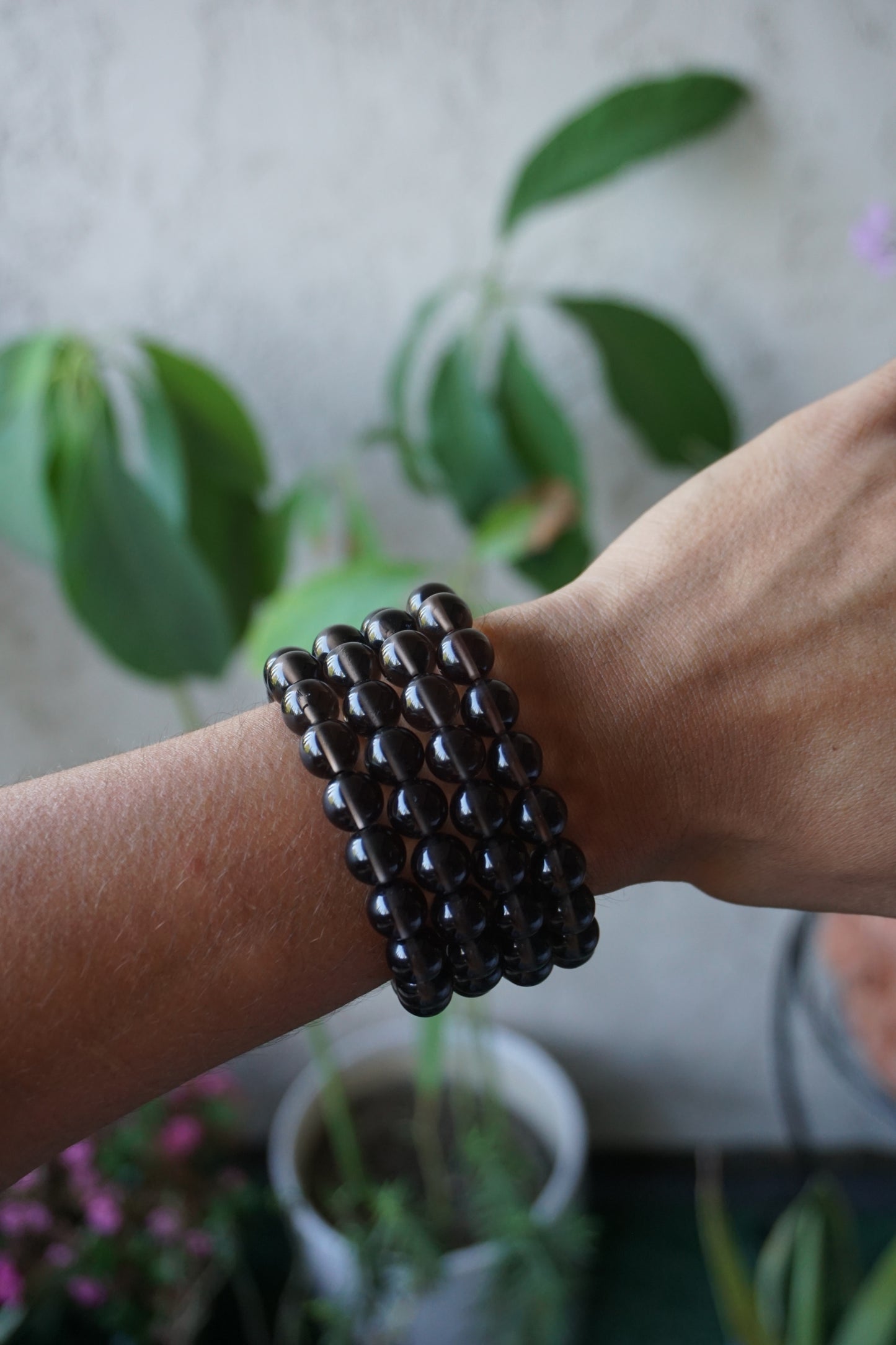 Smoky Quartz: A rich and earthy crystal, is treasured for its smoky brown to black hues that evoke a deep sense of grounding and protection.