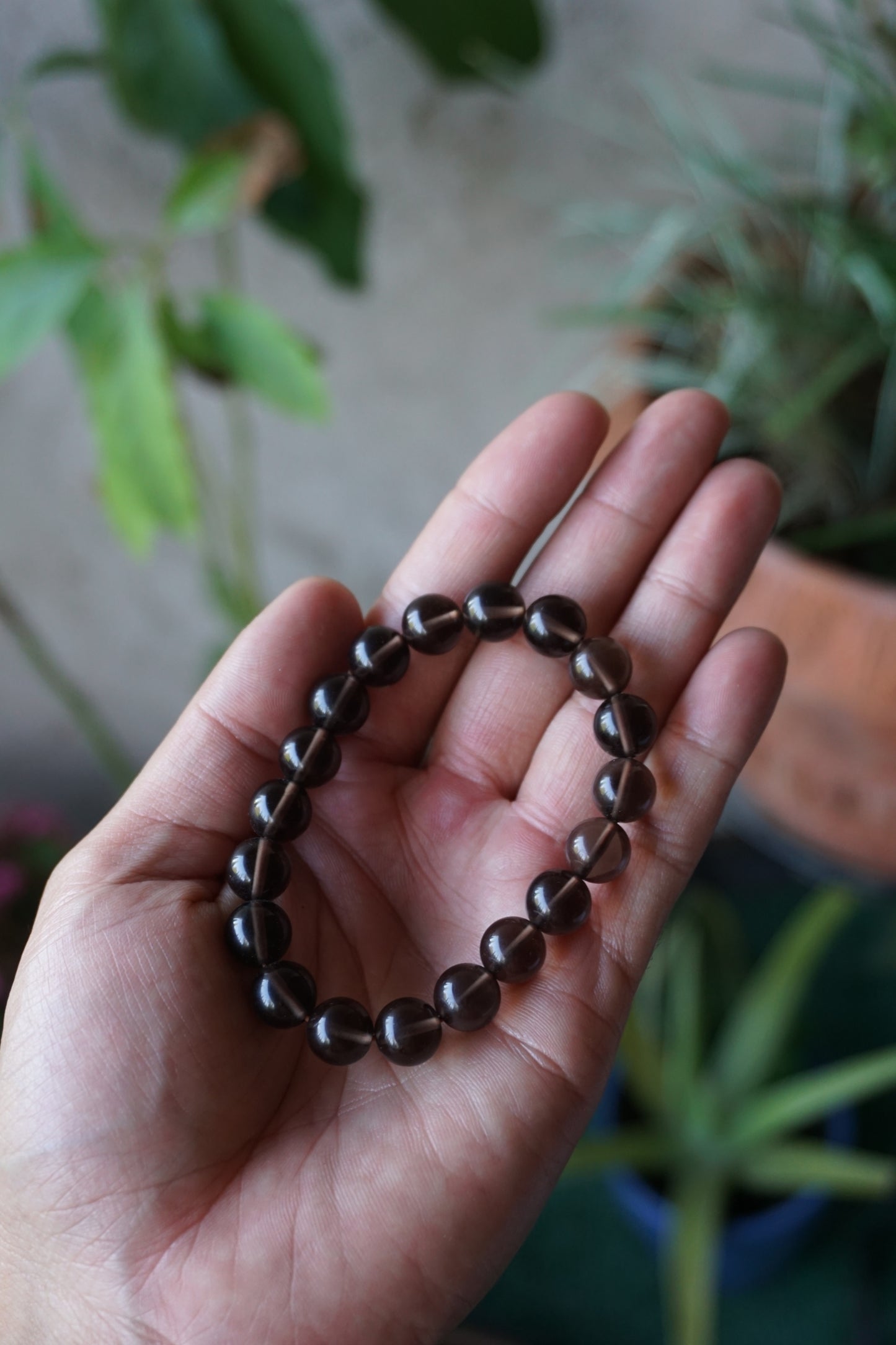 Smoky Quartz: A rich and earthy crystal, is treasured for its smoky brown to black hues that evoke a deep sense of grounding and protection.