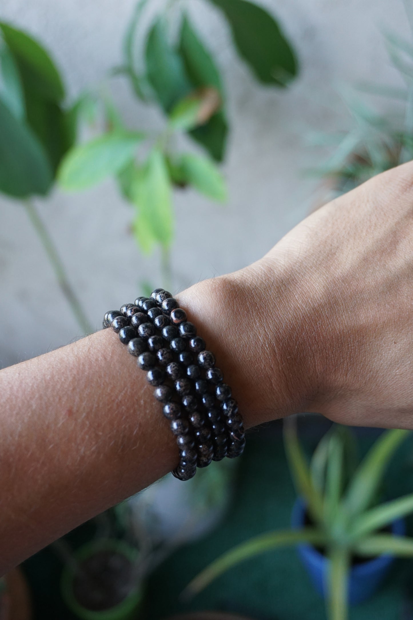 Snowflake Obsidian: A unique and mesmerizing crystal, is cherished for its black base color adorned with delicate white "snowflake" patterns. With its grounding and protective energy, Snowflake Obsidian is believed to promote inner balance, emotional healing, and a sense of security.