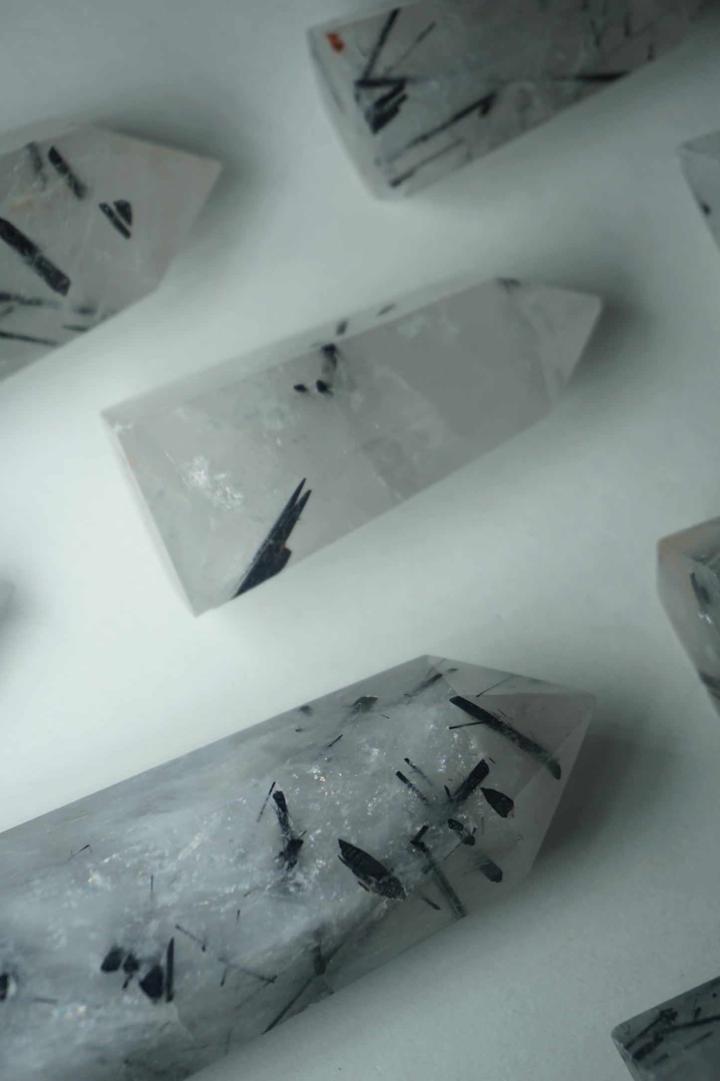 Rutile Quartz: A mesmerizing crystal characterized by golden or reddish-brown needle-like inclusions, is cherished for its powerful energetic properties.