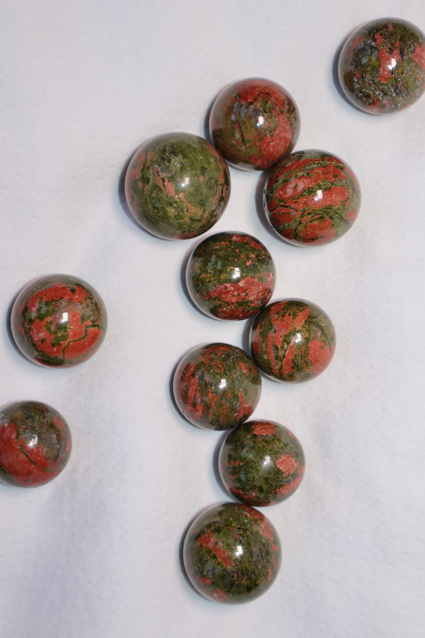 Unakite: A vision stone. It strikes a balance between emotions and spirituality. When needed, it gives grounding. It promotes rebirth by gently dissolving circumstances that stifle spiritual and psychological development.