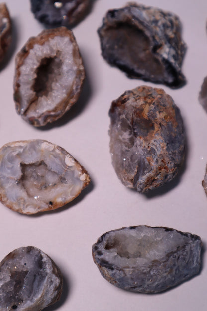Agate Geode: A captivating and unique crystal formation, is celebrated for its inner beauty concealed within its rough exterior.