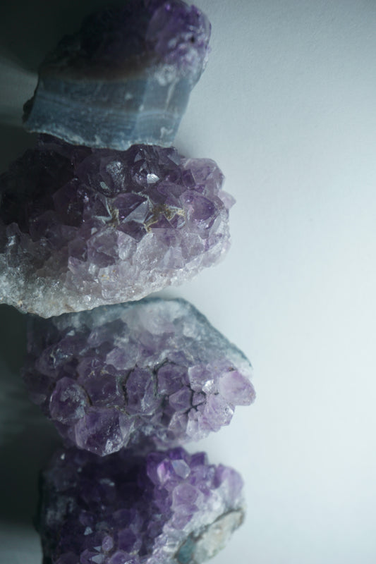 Amethyst: A captivating and iconic crystal, is cherished for its rich purple hues and its profound spiritual properties.