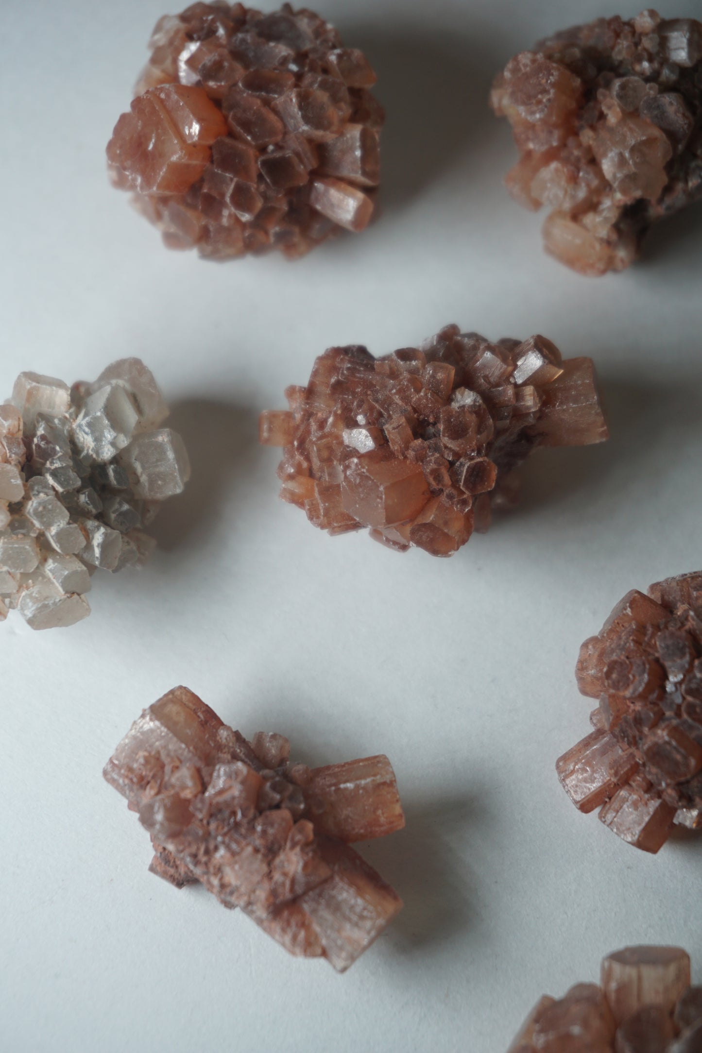 Aragonite Sputnik: A unique and captivating crystal formation, showcases a mesmerizing array of delicate radiating crystals that resemble the shape of a sputnik satellite.