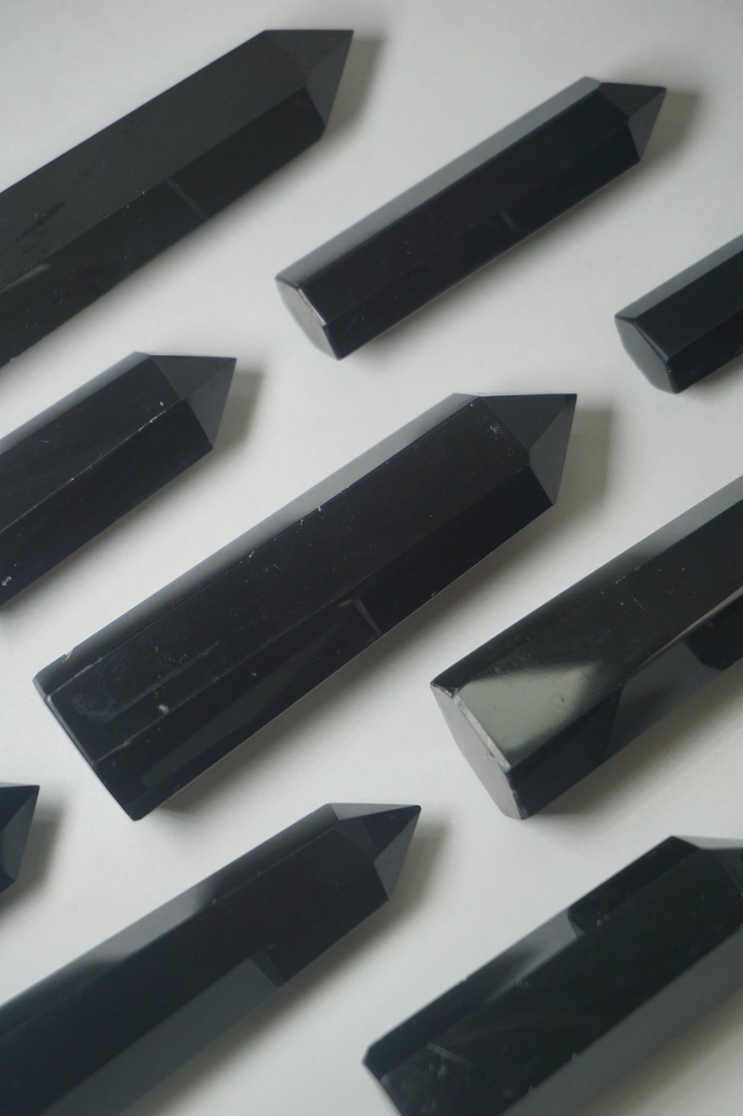Black Obsidian: A potent and grounding crystal, is revered for its intense protective properties and transformative energy.