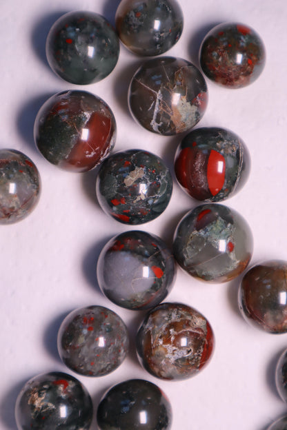 Bloodstone: A captivating green and red speckled crystal, is renowned for its powerful healing properties.