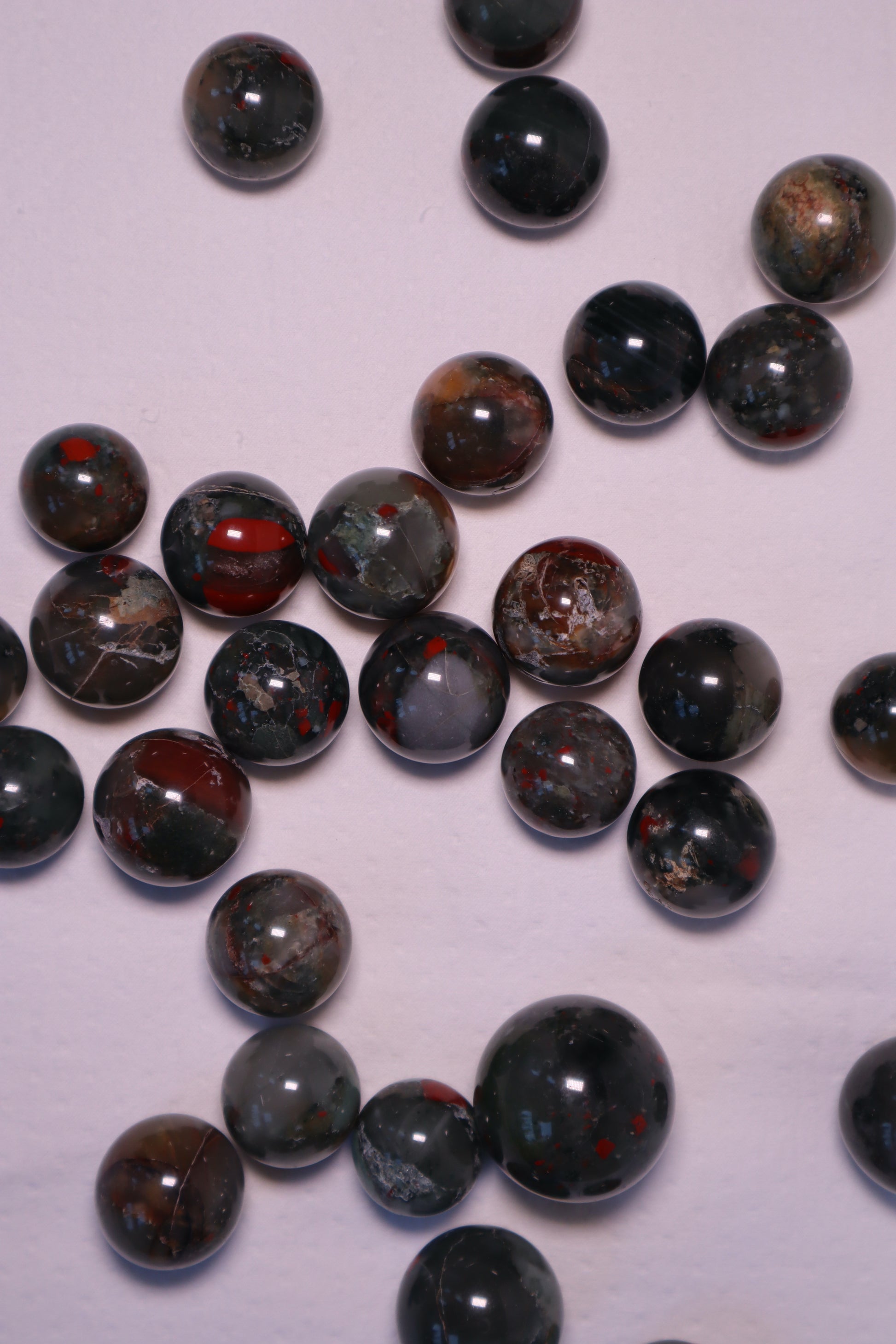 Bloodstone: A captivating green and red speckled crystal, is renowned for its powerful healing properties.