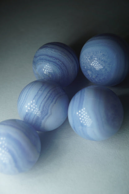 Blue Lace Agate: A highly cooling and relaxing stone, empowering one with a sense of serenity and calmness.