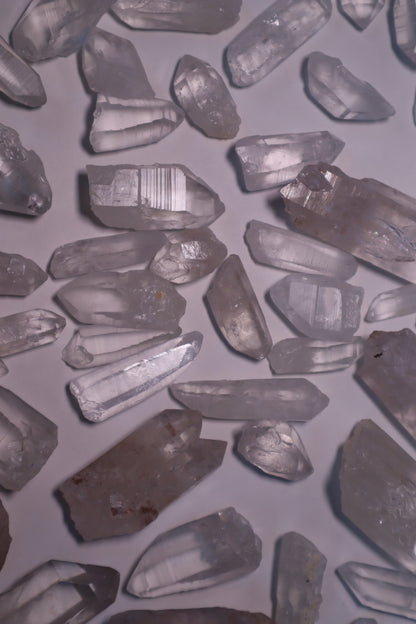 Clear Lemurian Quartz: Extraordinary formations known for their remarkable clarity and distinctive ladder-like striations.