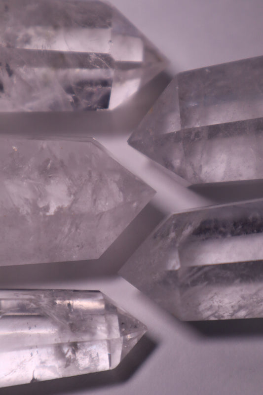 Clear Quartz: A universally revered and versatile crystal, is celebrated for its pure and transparent appearance. As a powerful amplifier of energy, Clear Quartz is believed to enhance intention-setting, manifestation, and the properties of other crystals.