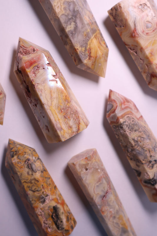 Crazy Lace Agate: A mesmerizing and vibrant stone, is celebrated for its intricate patterns resembling a whirlwind of colors and lines.