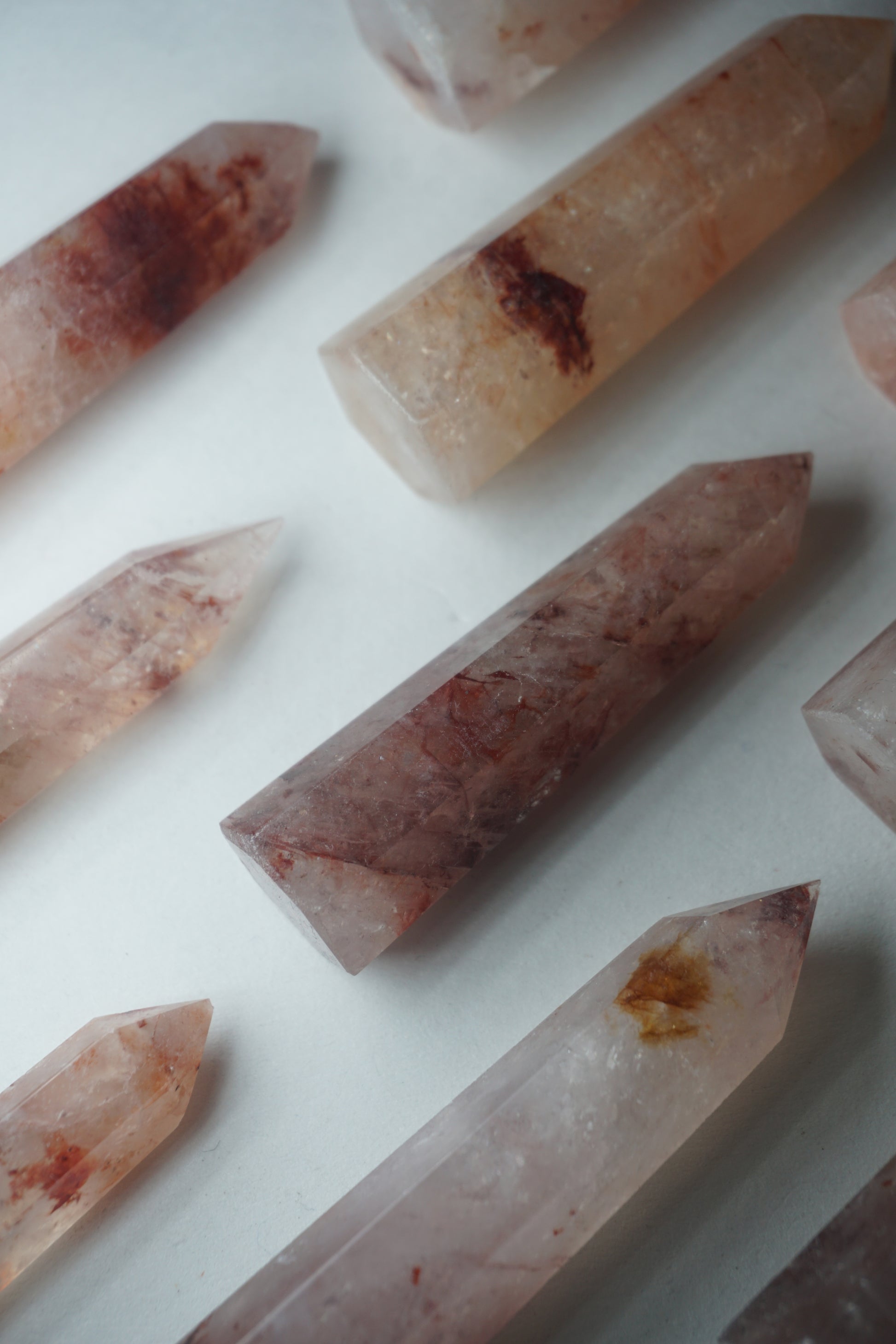 Fire Quartz: A captivating and energizing crystal, is revered for its vibrant orange and red hues that resemble flickering flames.