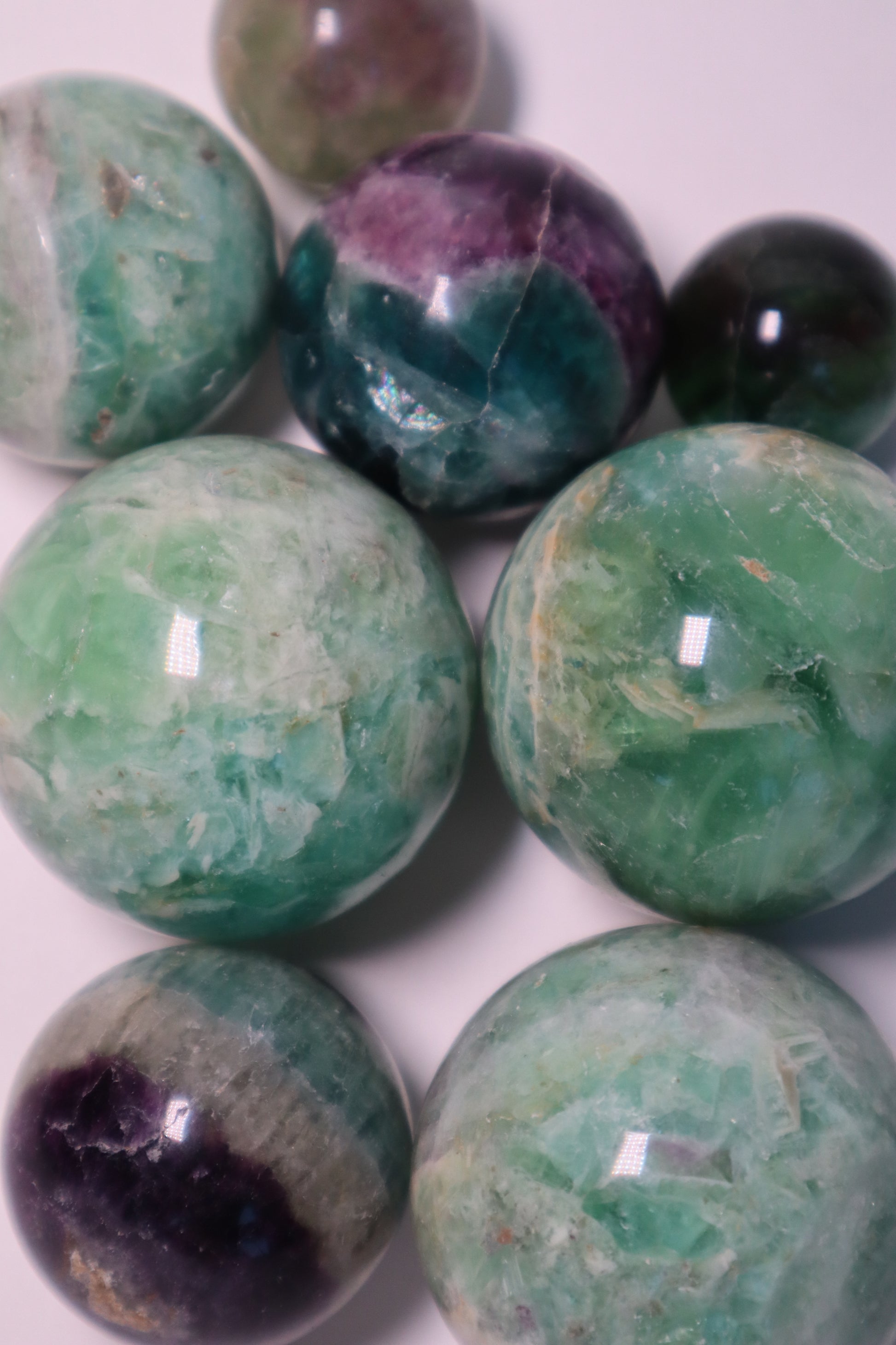 Fluorite: A captivating and multicolored crystal, is revered for its harmonizing properties that promote mental clarity, focus, and spiritual growth.