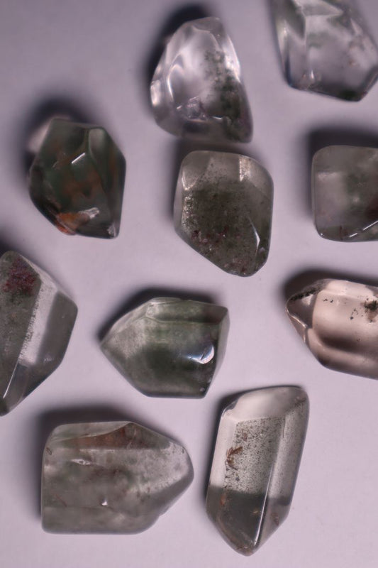 Garden Quartz: Also known as Lodolite or Scenic Quartz, is a captivating crystal celebrated for its intricate inclusions that resemble miniature landscapes or gardens captured within the stone.