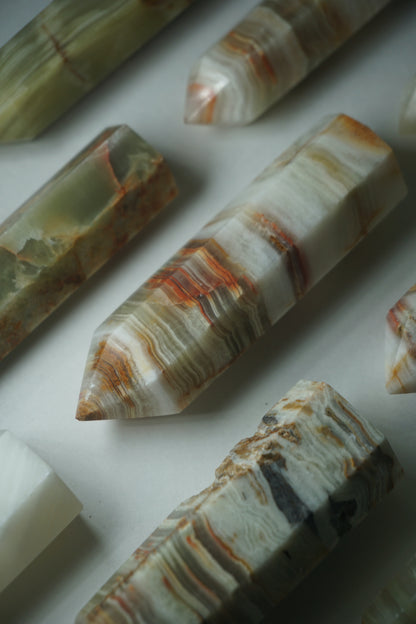Green Onyx: A soothing and revitalizing crystal, is prized for its serene green hues and its ability to promote emotional healing and renewal.
