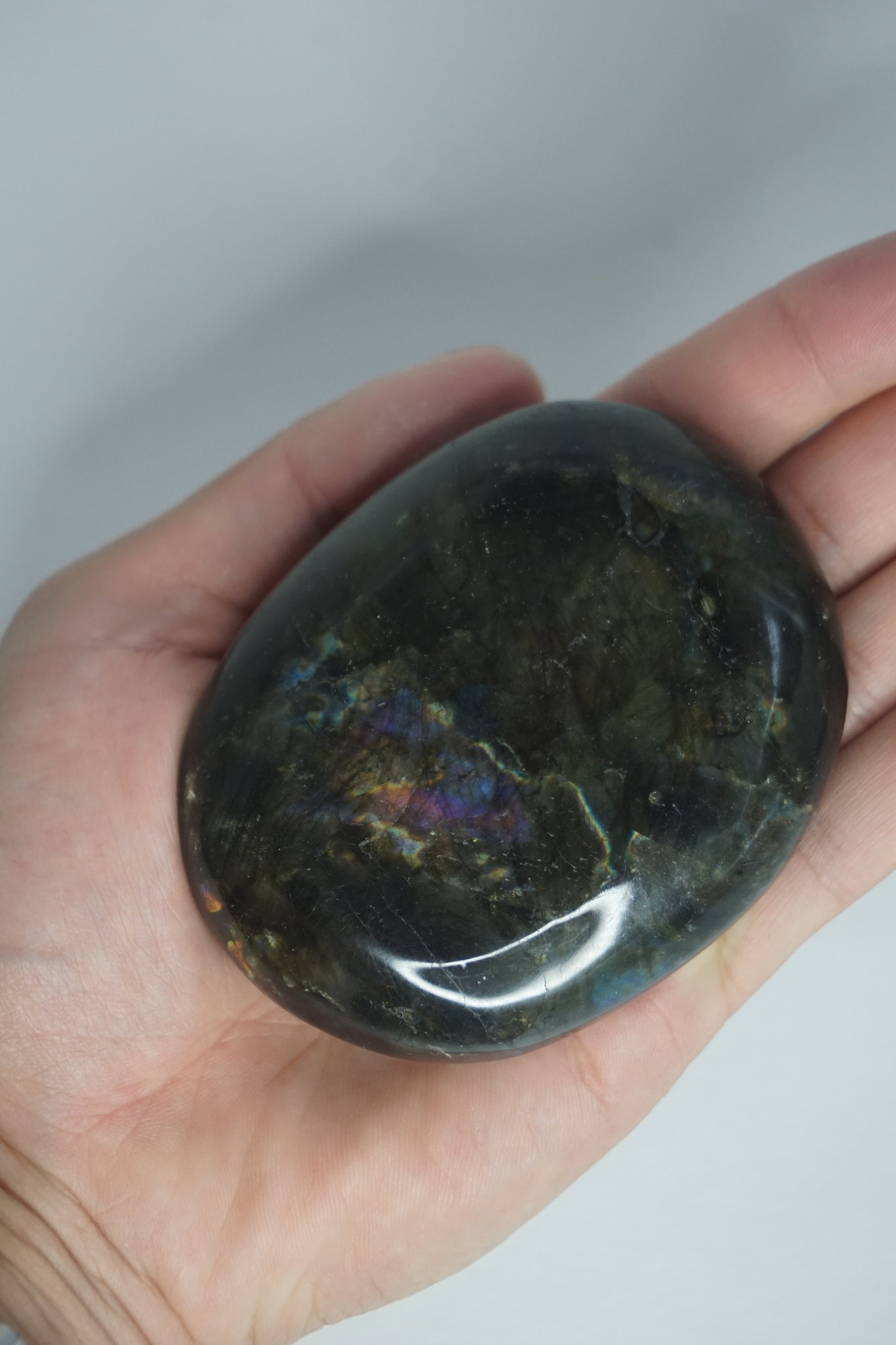 Labradorite: A mesmerizing and iridescent crystal known as the "Stone of Magic," captivates with its play of colors that shift and shimmer when viewed from different angles.