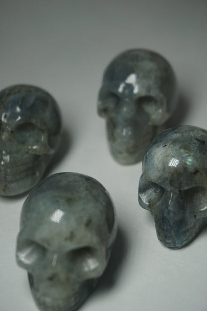 Labradorite: A mesmerizing and iridescent crystal known as the "Stone of Magic," captivates with its play of colors that shift and shimmer when viewed from different angles.