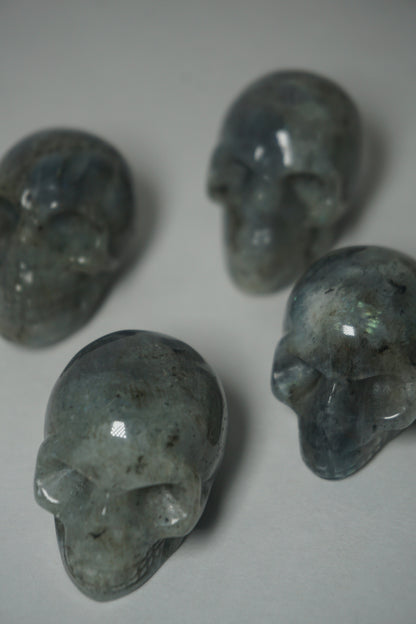 Labradorite: A mesmerizing and iridescent crystal known as the "Stone of Magic," captivates with its play of colors that shift and shimmer when viewed from different angles.