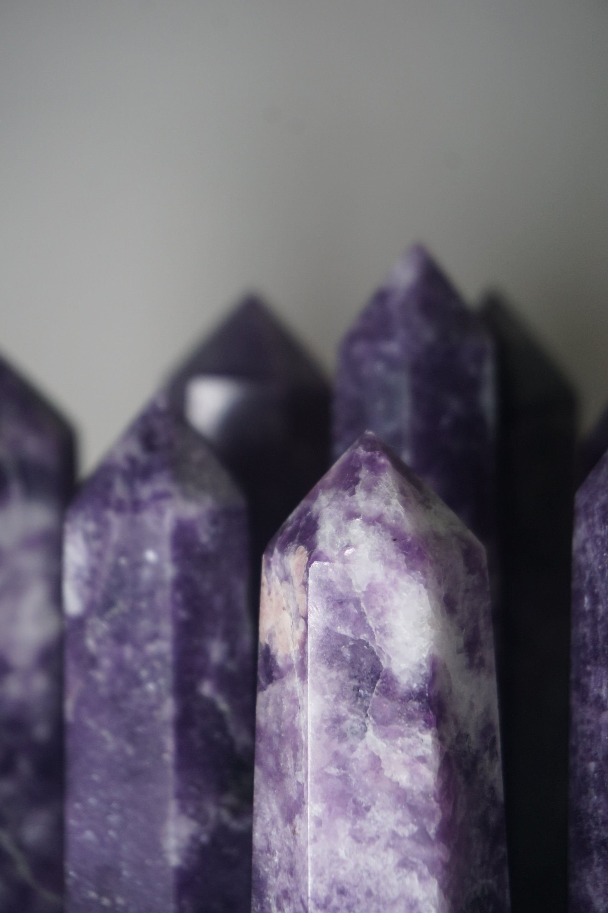 Lepidolite: A serene and calming crystal, is prized for its soft shades of purple and its potent connection to emotional healing and balance. With its association to the Heart, Third Eye, and Crown chakras, Lepidolite promotes inner peace, emotional release, and spiritual insight.