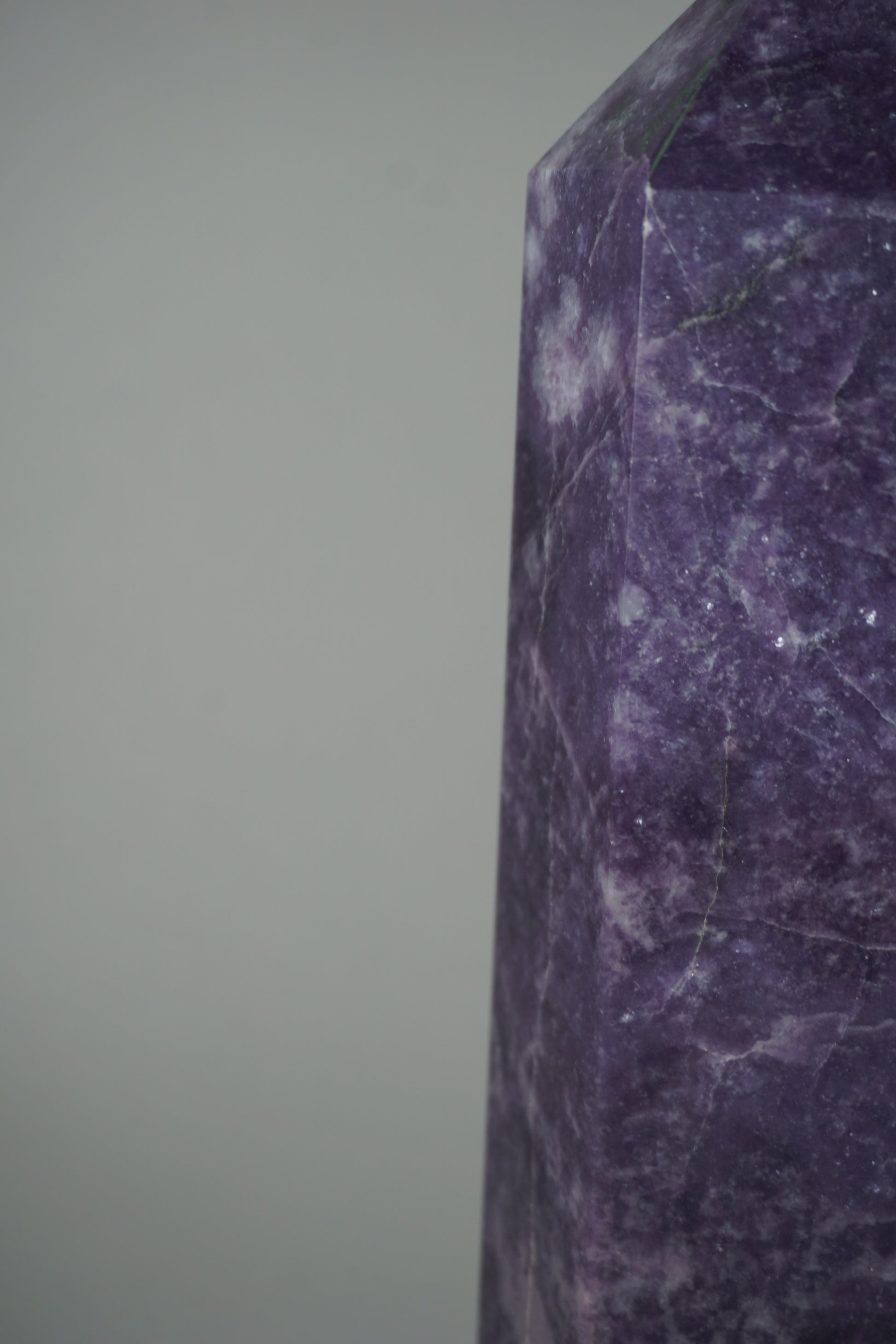 Lepidolite: A serene and calming crystal, is prized for its soft shades of purple and its potent connection to emotional healing and balance. With its association to the Heart, Third Eye, and Crown chakras, Lepidolite promotes inner peace, emotional release, and spiritual insight.