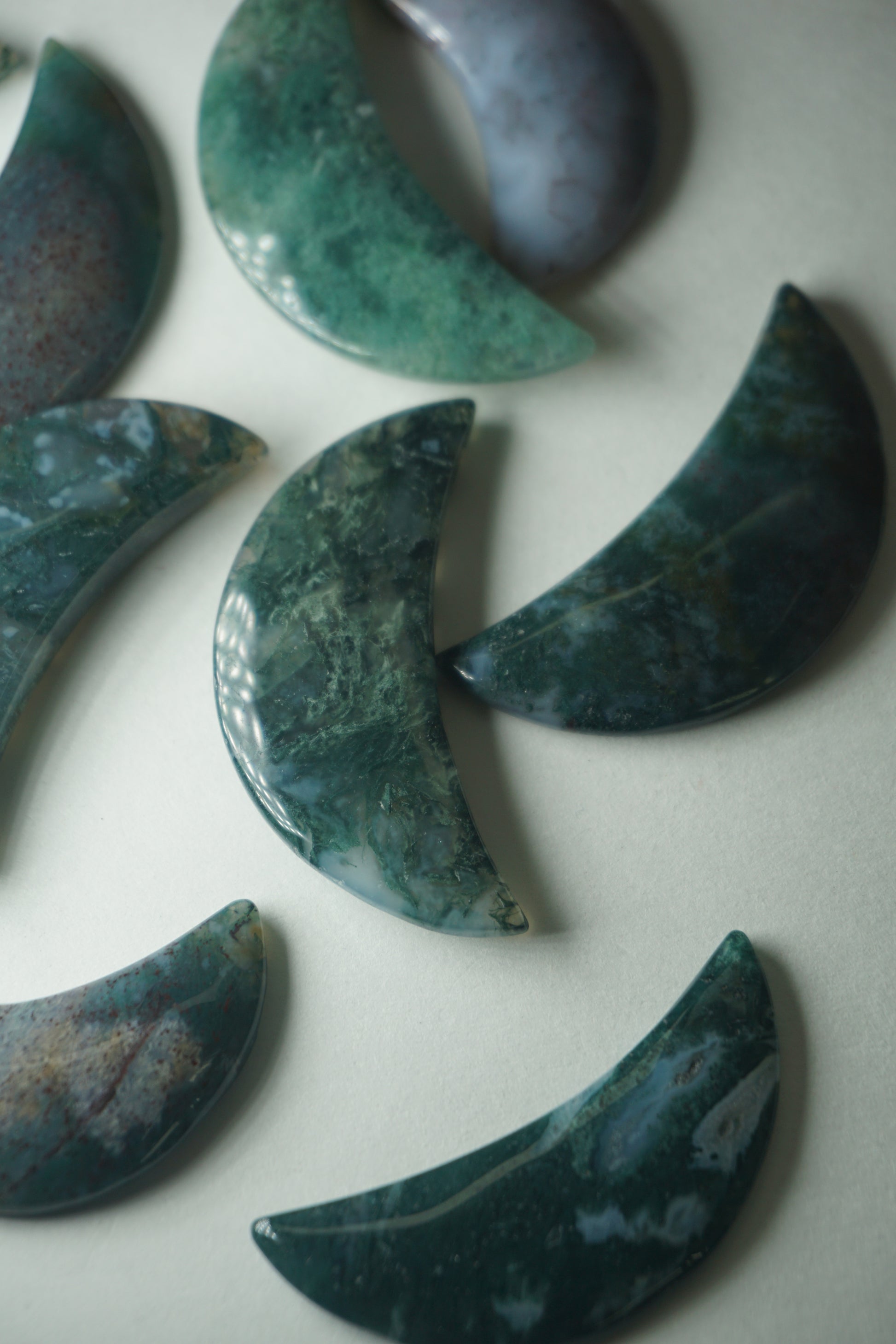 Moss Agate: A mesmerizing and earthy crystal, is treasured for its green hues and intricate patterns resembling lush moss-covered landscapes.