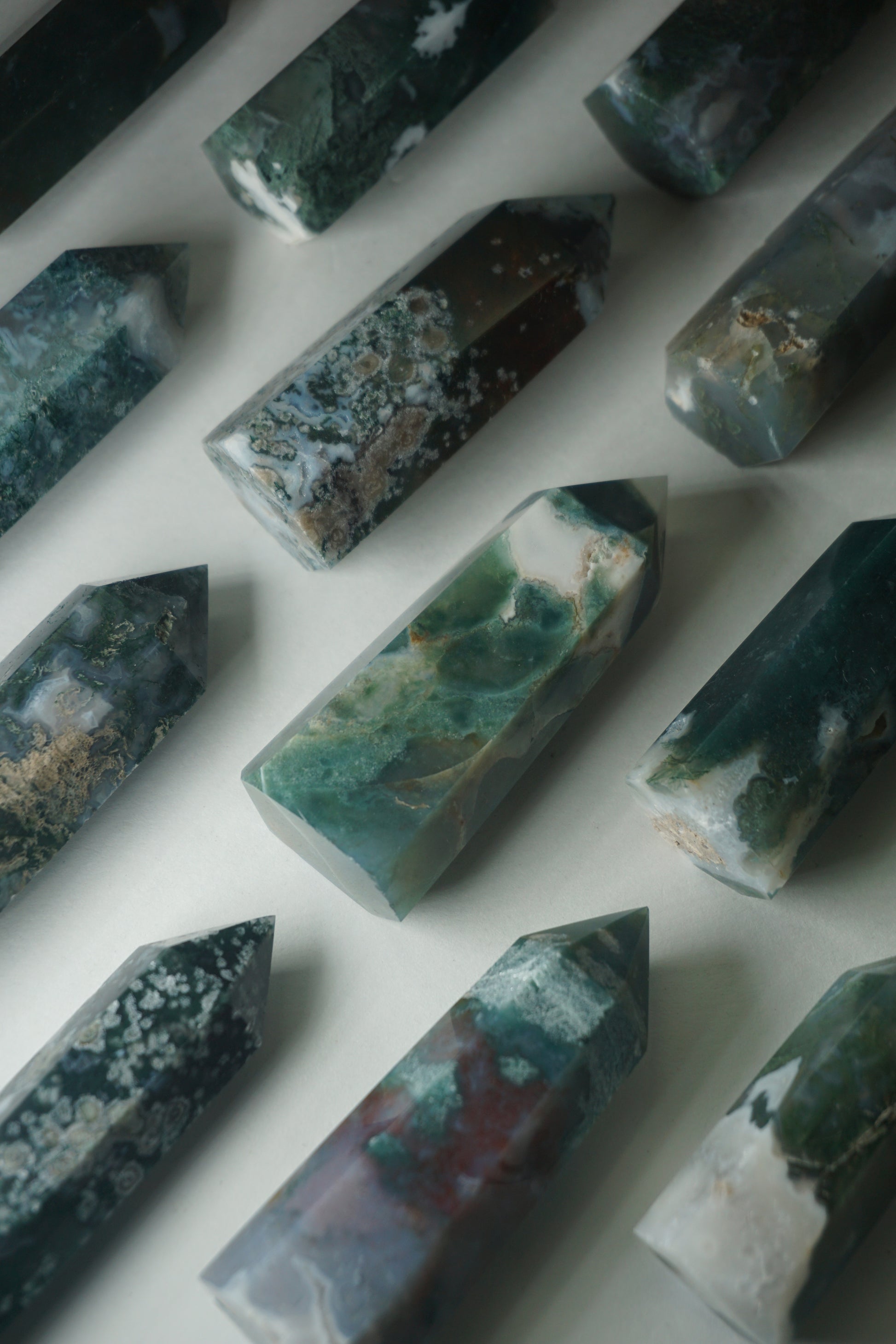 Moss Agate: A mesmerizing and earthy crystal, is treasured for its green hues and intricate patterns resembling lush moss-covered landscapes.