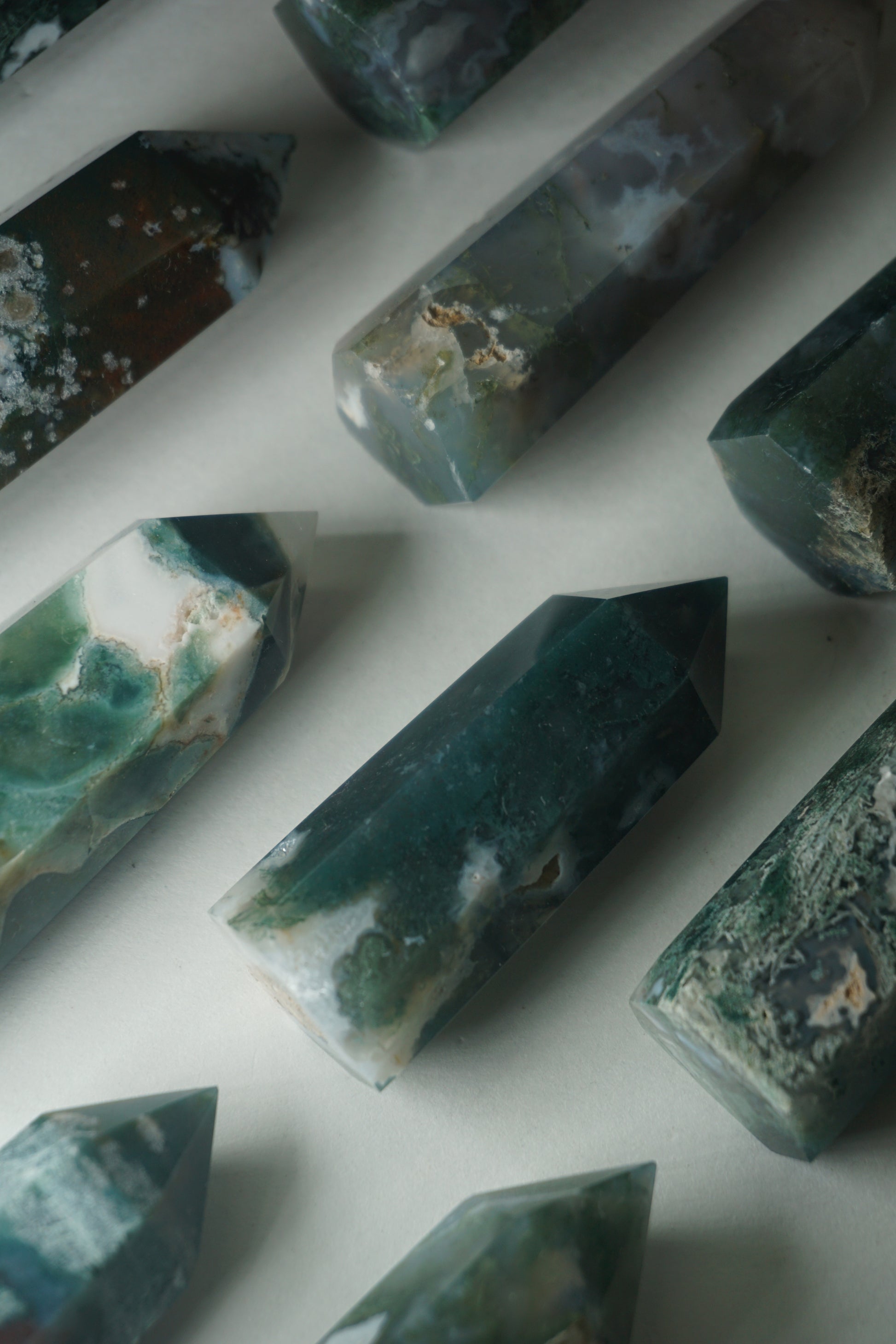 Moss Agate: A mesmerizing and earthy crystal, is treasured for its green hues and intricate patterns resembling lush moss-covered landscapes.
