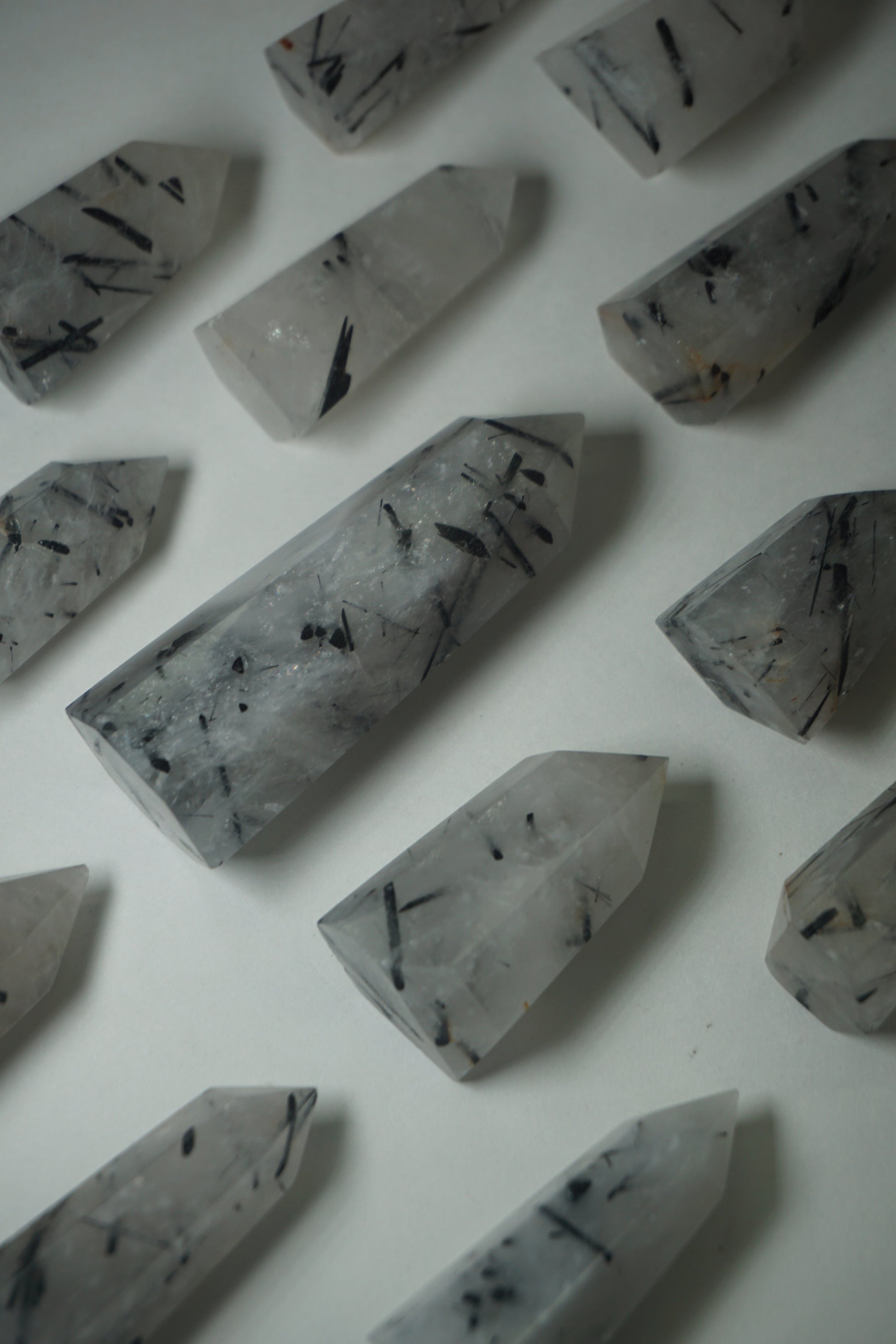 Rutile Quartz: A mesmerizing crystal characterized by golden or reddish-brown needle-like inclusions, is cherished for its powerful energetic properties.
